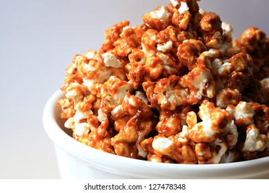 Caramel Popcorn In A White Bowl.