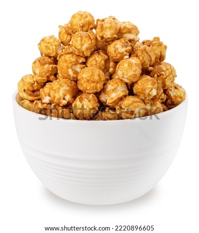 Caramel Popcorn in white bowl isolated on white background, Mushroom Popcorn on white With work path.