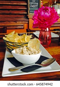 Caramelized Onion Dip With A Basket Of Chips