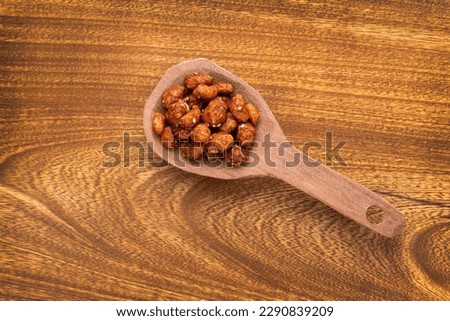 Caramelized roasted peanut with sesame seeds - Arachis hypogaea
