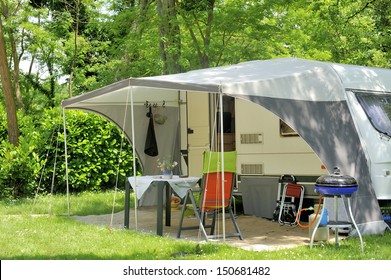 Caravan With A Awning At A Camp Site