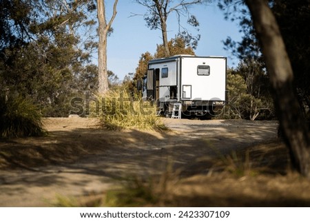 Caravan camping at a camp ground off grid on a holiday in spring	