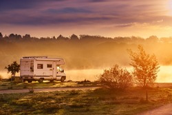 Caravan Camping On Lake Shore In Portugal. Camper Trip In Autumn Time. Foggy Misty Peace Morning, Sunrise Light.