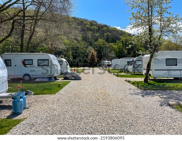 Caravan\
Camping Site, Caravans in a Camp Site, Relaxing Campsite in nature,\
Travel Trailers, Trailer park, Summer Tourist Camping. Selective\
focus. Riva, Istanbul, Turkey - April 04,\
2022.