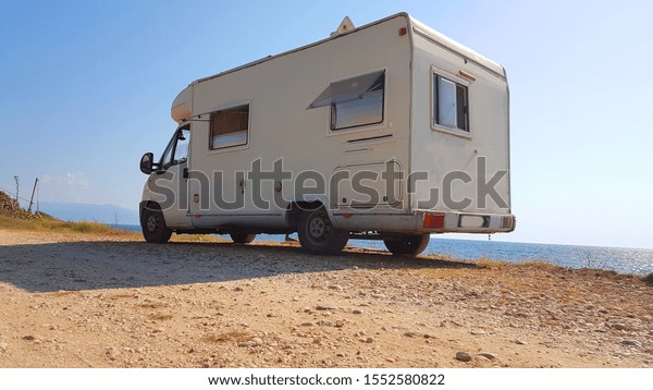 caravan car by
the sea holidays in summer 
greece