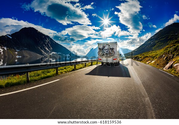 Caravan car travels on the highway. Tourism\
vacation and traveling.