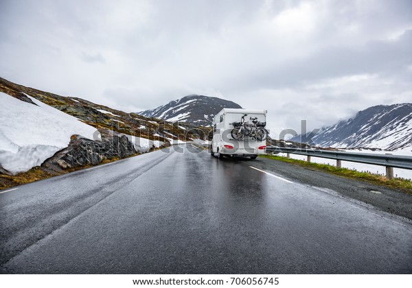 Caravan car travels on the highway. Tourism
vacation and traveling.