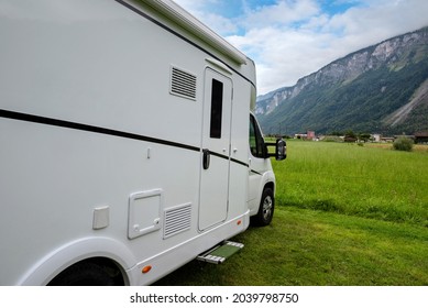 Caravan Car Vacation. Family Vacation Travel RV. Holiday Trip In Motorhome. Switzerland Natural Landscape