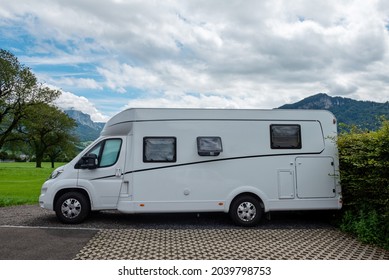 Caravan Car Vacation. Family Vacation Travel RV. Holiday Trip In Motorhome. Switzerland Natural Landscape