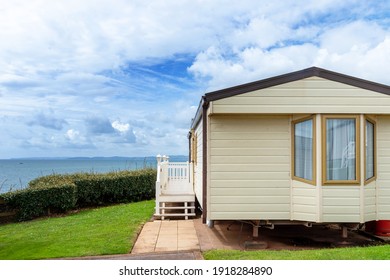 Caravan holiday park with white mobile houses, typical resort of English seaside.