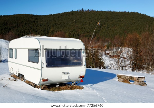Caravan on a snowy\
mountain