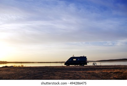 caravan silhouette in alqueva lake, Portugal