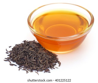 Caraway Seeds With Essential Oil In Glass Bowl