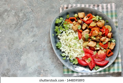 Carb Free Lunch Keto Diet. Fried Chicken Breast With Vegetables And Cauliflower Rice. Keto Recipe. Top View. Copy Space