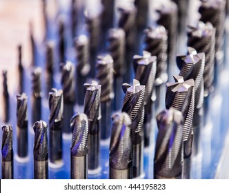 Carbide metalcutting mills rows. Tools for cnc-machining.