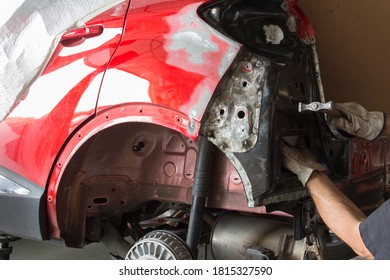 Carbody, Gesture And Movement Of Job, Handiwork. Man Working With Industrial Tools For Auto Body Shop.