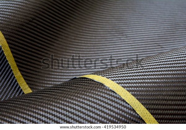 carbon fiber\
composite material\
background
