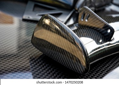 Carbon fiber composite product for motor sport and automotive racing - Shutterstock ID 1470250208