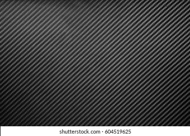 Carbon fiber composite raw material background - Shutterstock ID 604519625