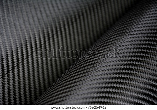 Carbon fiber\
composite raw material\
background