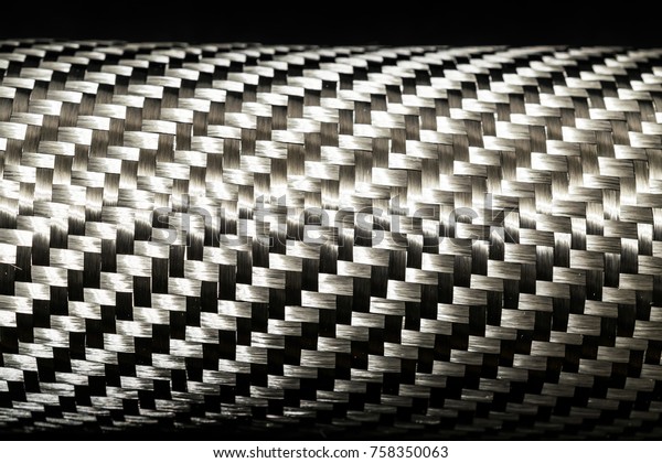 Carbon fiber raw\
composite texture close\
up