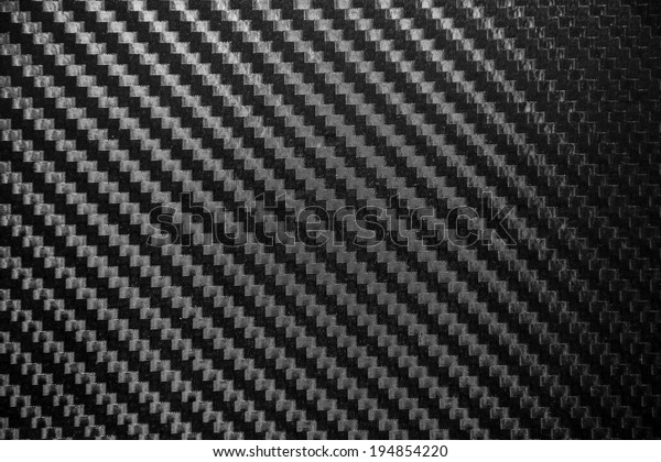 Carbon fiber texture background. para-aramid
synthetic fiber.