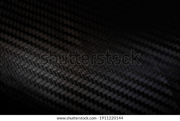 Carbon fiber texture background
with right light Carbon fiber composite raw material
background