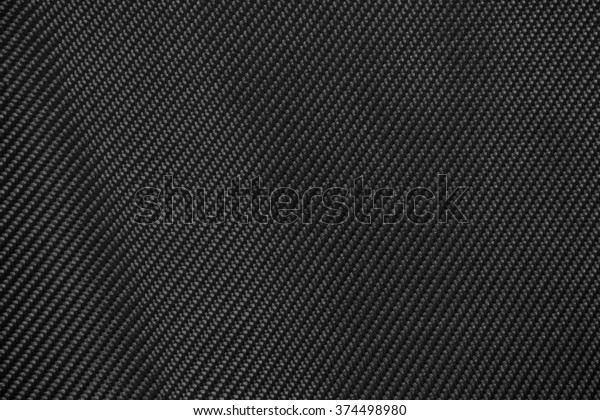 carbon fiber\
twill composite material\
background