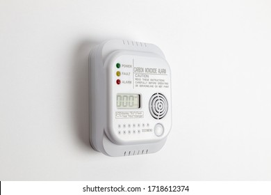 Carbon Monoxide Detector On A White Wall. Stay Home Safe. Home Control And Security.  CO Detector