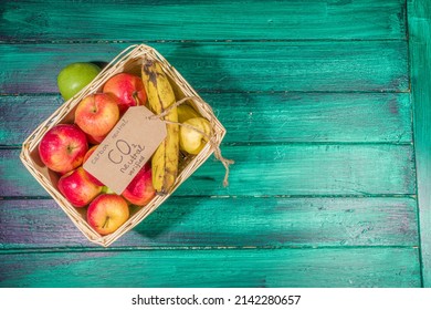 Carbon Neutral, CO2-free Concept Product. Natural Organic Farm Fruit Apples, With CO2 Neutral Tag Verified, On Wooden Desk In Farm Store