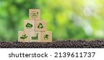 Carbon neutral and net zero concept natural environment Climate-neutral long-term strategy greenhouse gas emissions targets Wooden block with green net center icon