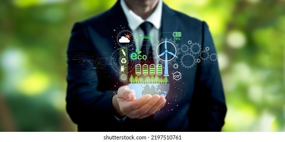 Carbon neutrality net zero. The hand of pollution and effective management with netzero symbols - renewable energy, reduced CO2 emissions, green production, and waste recycling with regard to business - Shutterstock ID 2197510761