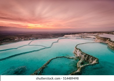 Carbonate travertines the natural pools during sunset, Pamukkale, Turkey - Powered by Shutterstock