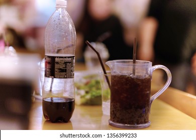 Carbonated Beverages In Jug And Bottle On Party Background