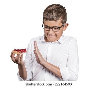 Carbs Cravings. Portrait Teenager Boy Craving Cake Confused Funny Looking Man Trying To Withstand Resist Temptation To Eat Sweet Tart Isolated White Background. Facial Expression Emotion Reaction