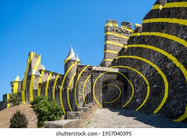 Carcassonne, Languedoc, France; July 23, 2018: Carcassonne medieval fortress decorated with the yellow concentric circles