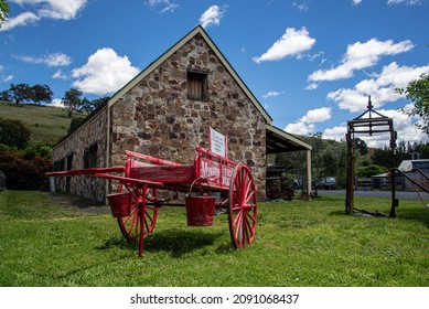 Carcoar, NSW, Australia - December 12 2021: Old Fire Brigade Wagon On Display In Front Of The Stokes Stable Museum In The Historical Village Of Carcoar NSW Australia.