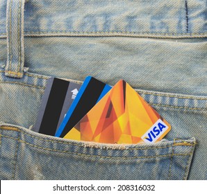 Card in a back pocket of a denim jean as a background