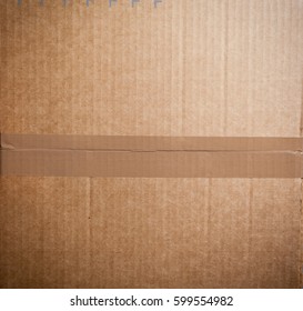 Card Board Box Sealed With Brown Packing Tape