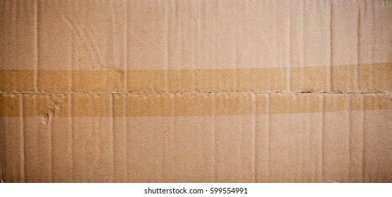 Card Board Box Sealed With Brown Packing Tape