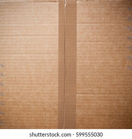 Card Board Box Sealed With Brown Packing Tape