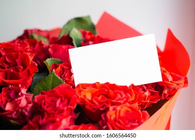 Card In Bouquet Of Red Roses. Secret Admirer. Valentines Day