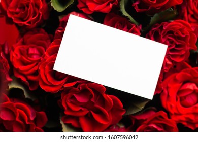 Card In Bouquet Of Red Roses. Secret Admirer. Valentines Day