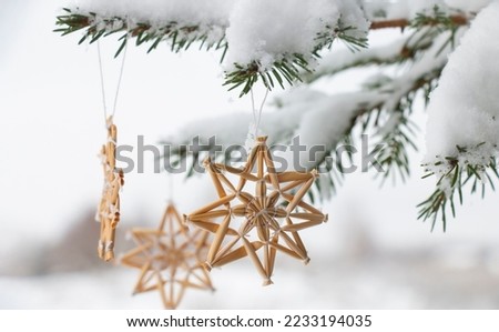 CARD FOR CHRISTMAS. christmas decoration on a winter snowy day. Christmas decorations HANDMADE FROM STRAW Stock photo © 
