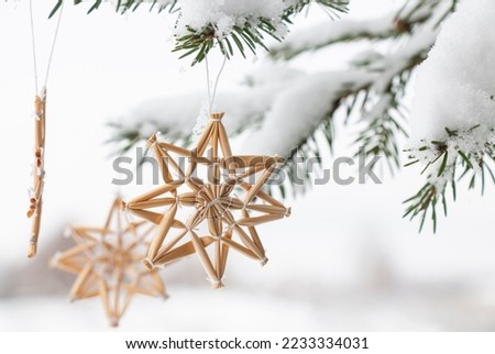 CARD FOR CHRISTMAS. christmas decoration on a winter snowy day. Christmas decorations HANDMADE FROM STRAW Stock photo © 