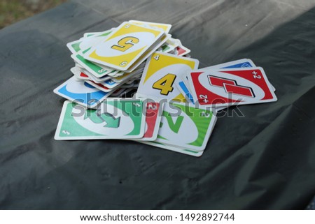 Card game on table while camping