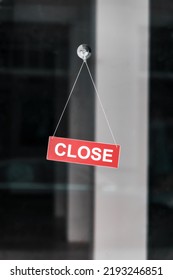 a card with information about the closing of the store in the window. Business bankrupt. - Shutterstock ID 2193246851