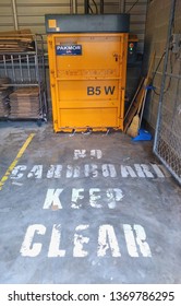 Cardboard Baler For Recycling And A Big Keep Clear On The Ground Sine Sydney Australia Work Site April 2019