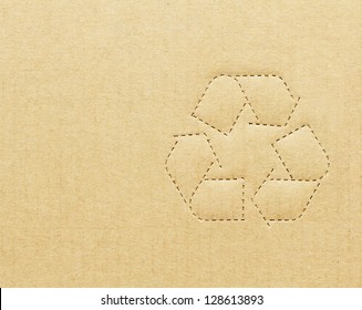 Cardboard Box Background With Recycle Symbol