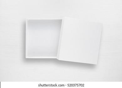 Cardboard Box With Cover On White Table Top View